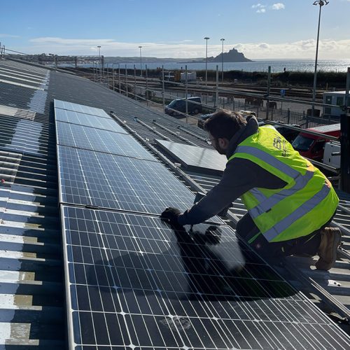 Electrical South West team member installing solar panel