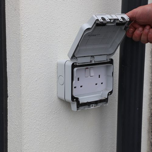 External power socket in weatherproof enclosure