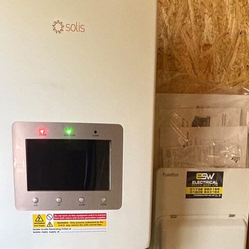 Solar panel converter next to consumer unit